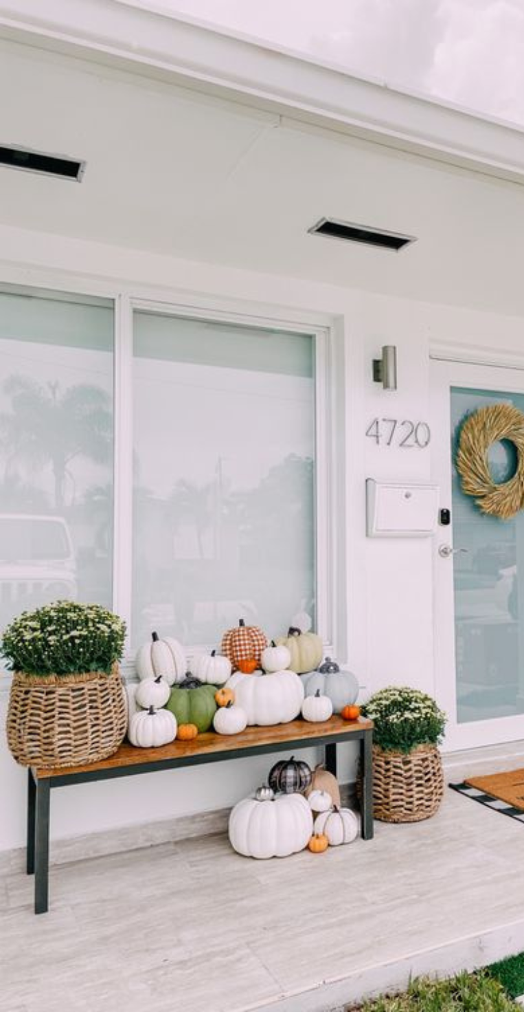 10 Beautiful Ways to Decorate your Front Porch with Pumpkins