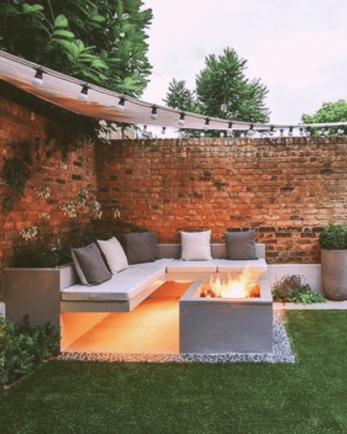 corner garden seating area brick walled garden